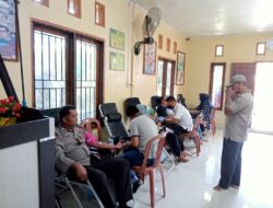 HUT Transmigrasi Desa Beringin Makmur, Polsek Kerumutan Ikut Donor Darah