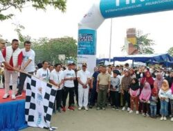 HUT Ke-25 BUMN, Bupati Pelalawan Meriahkan Acara Jalan Sehat Bersama 