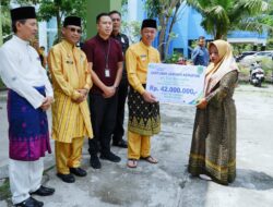 Bupati Rohil Serahkan Santunan BPJS Kepada Almarhum Pegawai Satpol PP