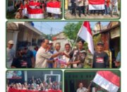 Jajaran Pengurus Dan Anggota DPC GWI Pesawaran Bagikan Bendera Merah Putih di Desa Sukajaya Lempasing