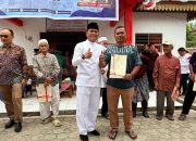 Bupati Pelalawan Serahkan 236 Sertifikat Program Redistribusi Tanah Tahun 2025 di Desa Pangkalan Gondai