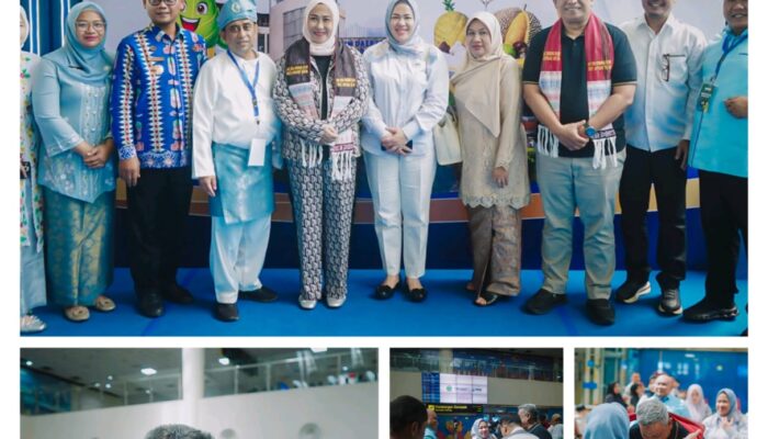 Disambut Ulos di Kualanamu, Bupati Anton Bawa Misi Kolaborasi dan Program Terbaik untuk Rokan Hulu