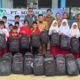 Dukung Pendidikan di Pelalawan, PT Musim Mas Salurkan 480 Paket Perlengkapan Sekolah Melalui Program GNOTA