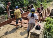 Pemdes Pelajaran 2 Bangun Jalan Usaha Tani Rabat Beton 115 Meter dan Perbaiki Jembatan: Permudah Akses Pertanian dan Tingkatkan Kesejahteraan Masyarakat