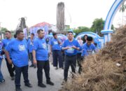 Gerakan Langit Biru Demokrat Rohul, 275 Kader Bersihkan Pemakaman dan Bagikan 150 Paket Sembako